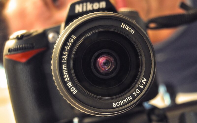 Nikon Camera Lens — Black, Neutral, Photograph, Person, Silver