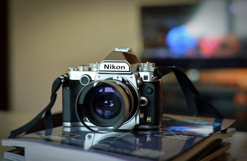 Nikon camera on magazine