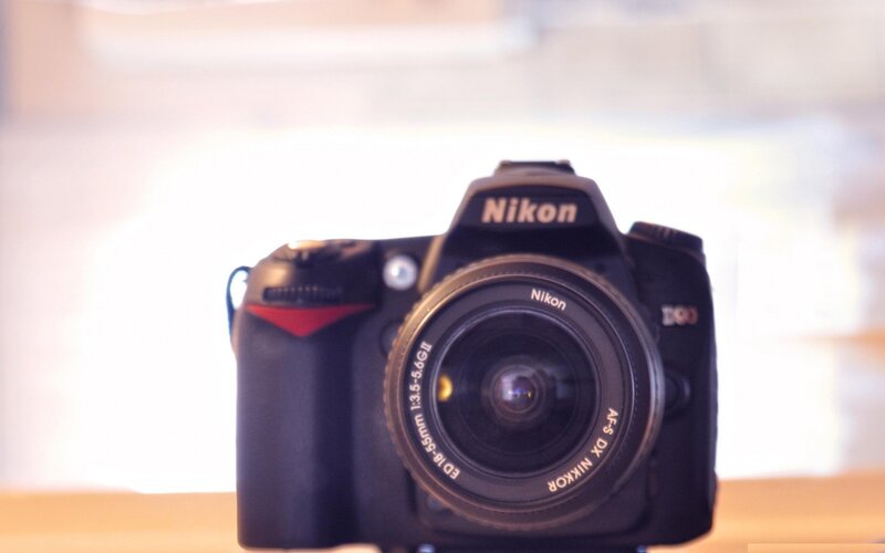 Nikon D300 camera with lens