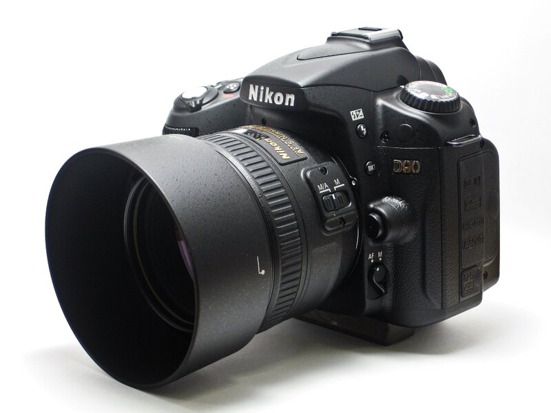 Nikon D90 camera with lens