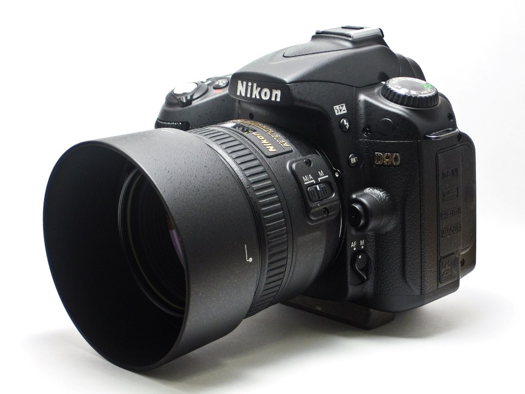 Nikon D90 camera with lens