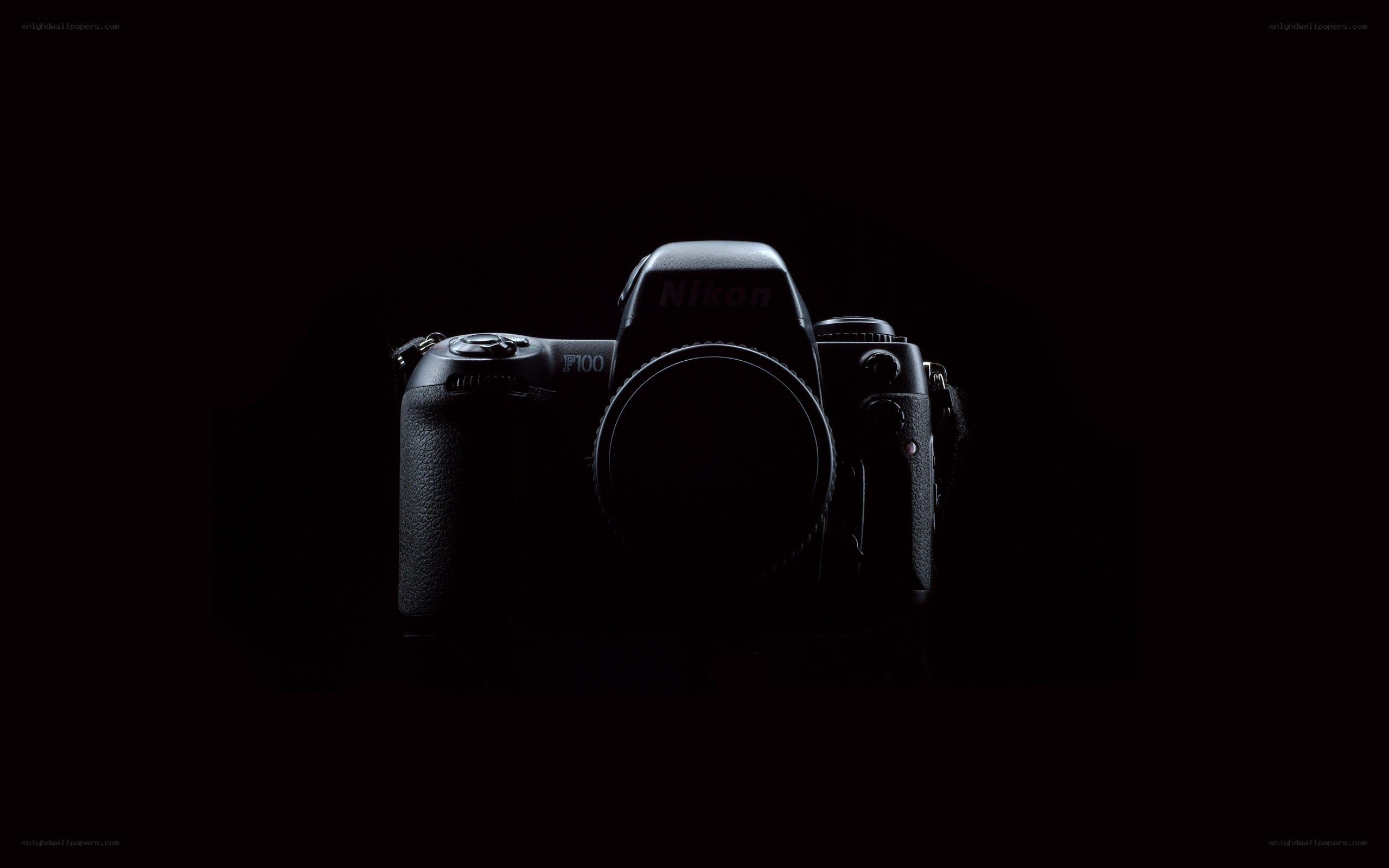 Nikon F100 camera in darkness