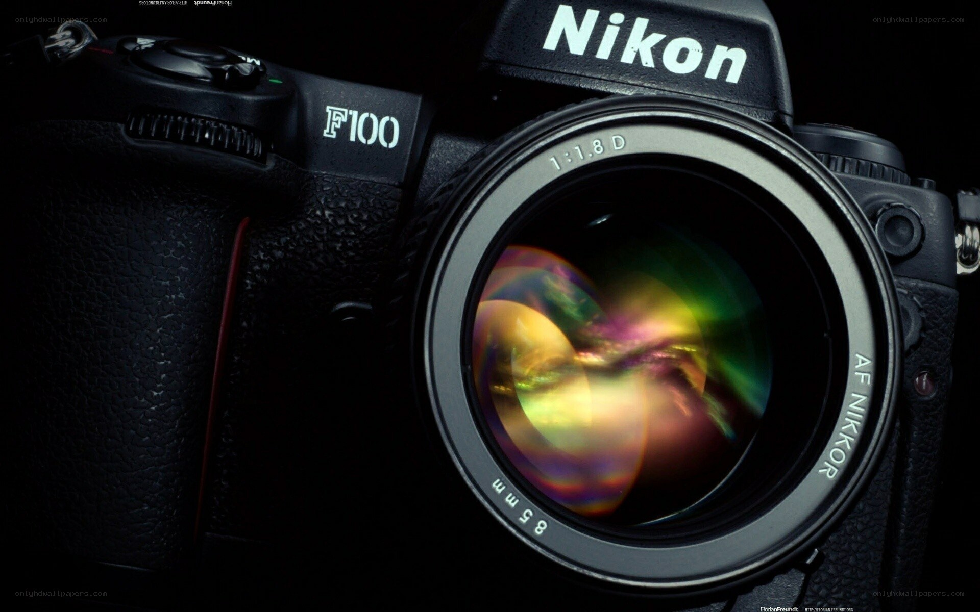 Nikon F100 camera with lens