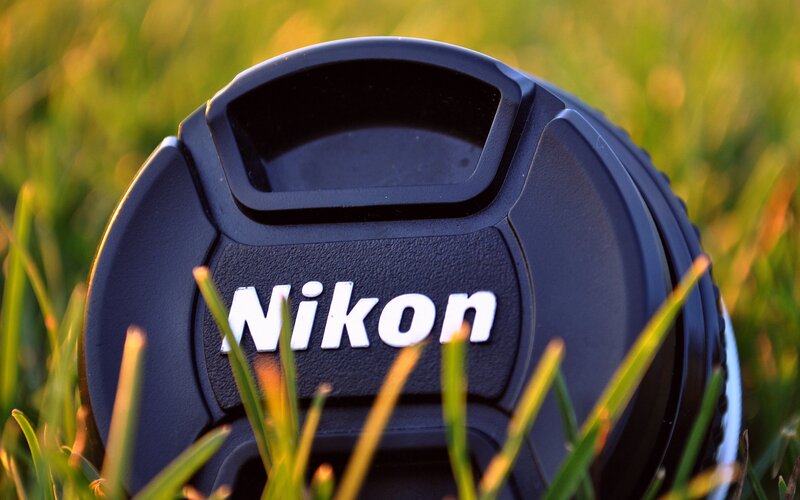 Nikon lens cap on grass