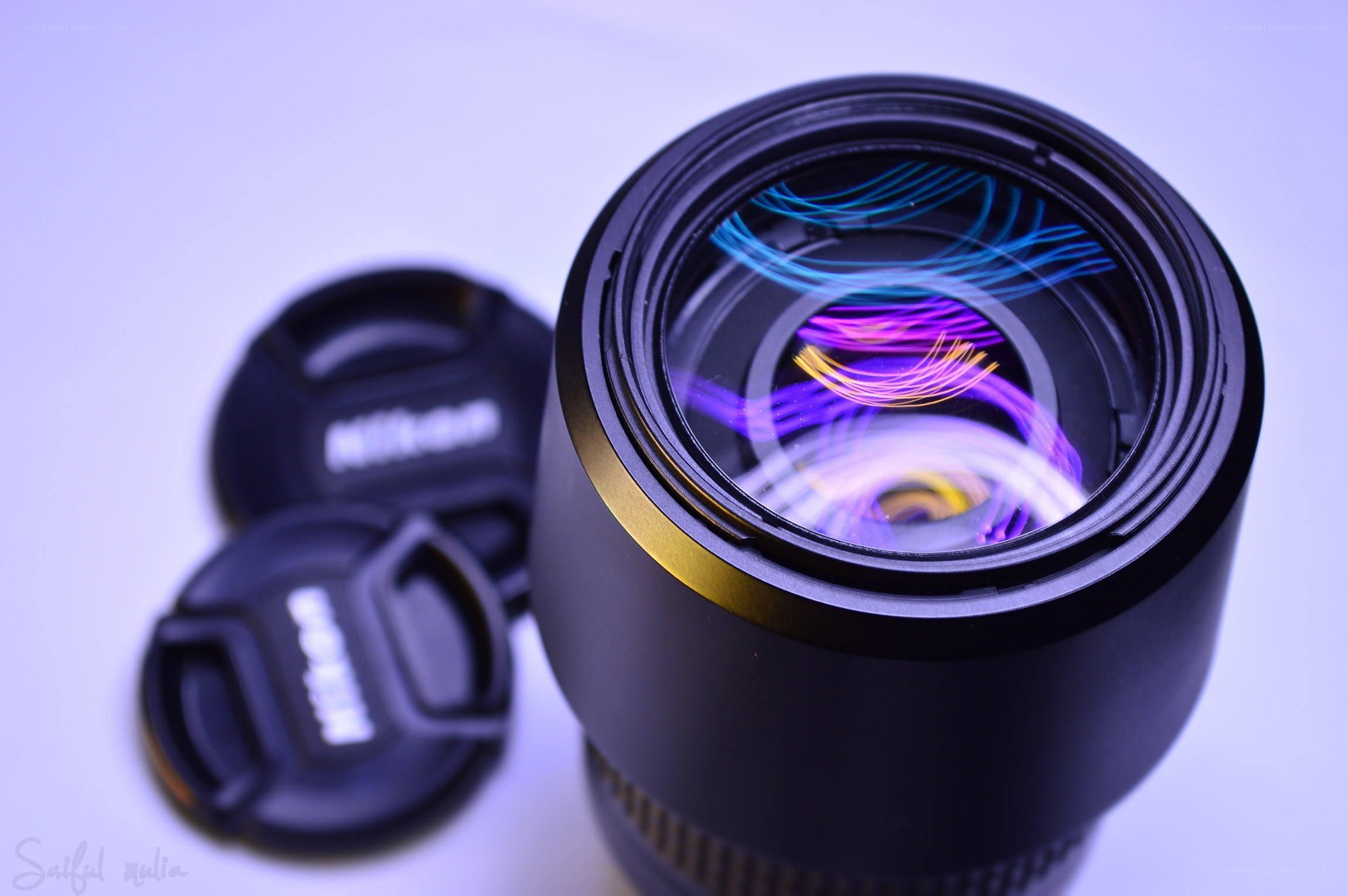Nikon lens with colorful light trails