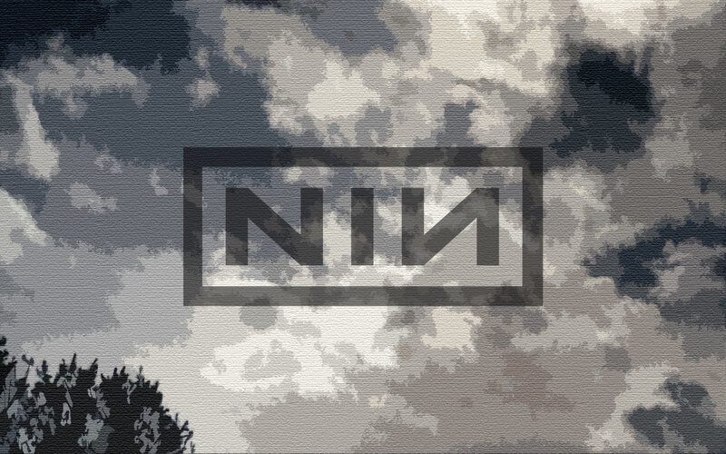 NIN logo on cloudy sky