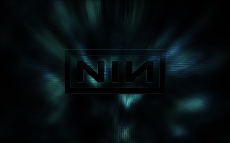 NIN logo on dark background
