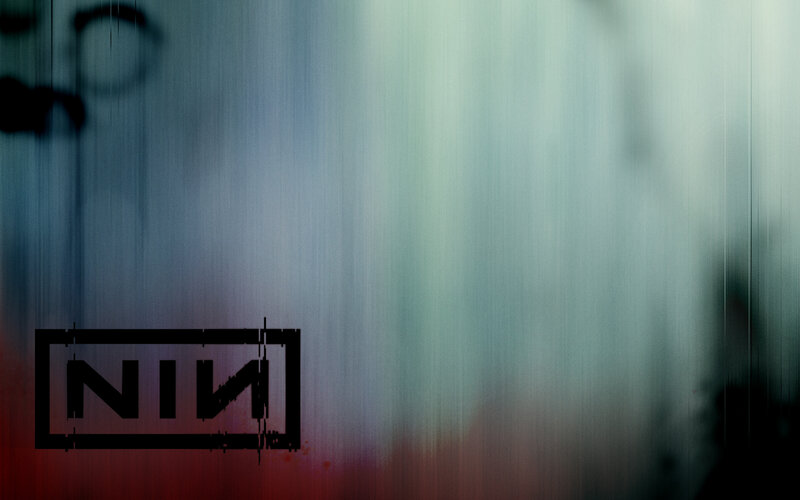 NIN Logo on Textured Background