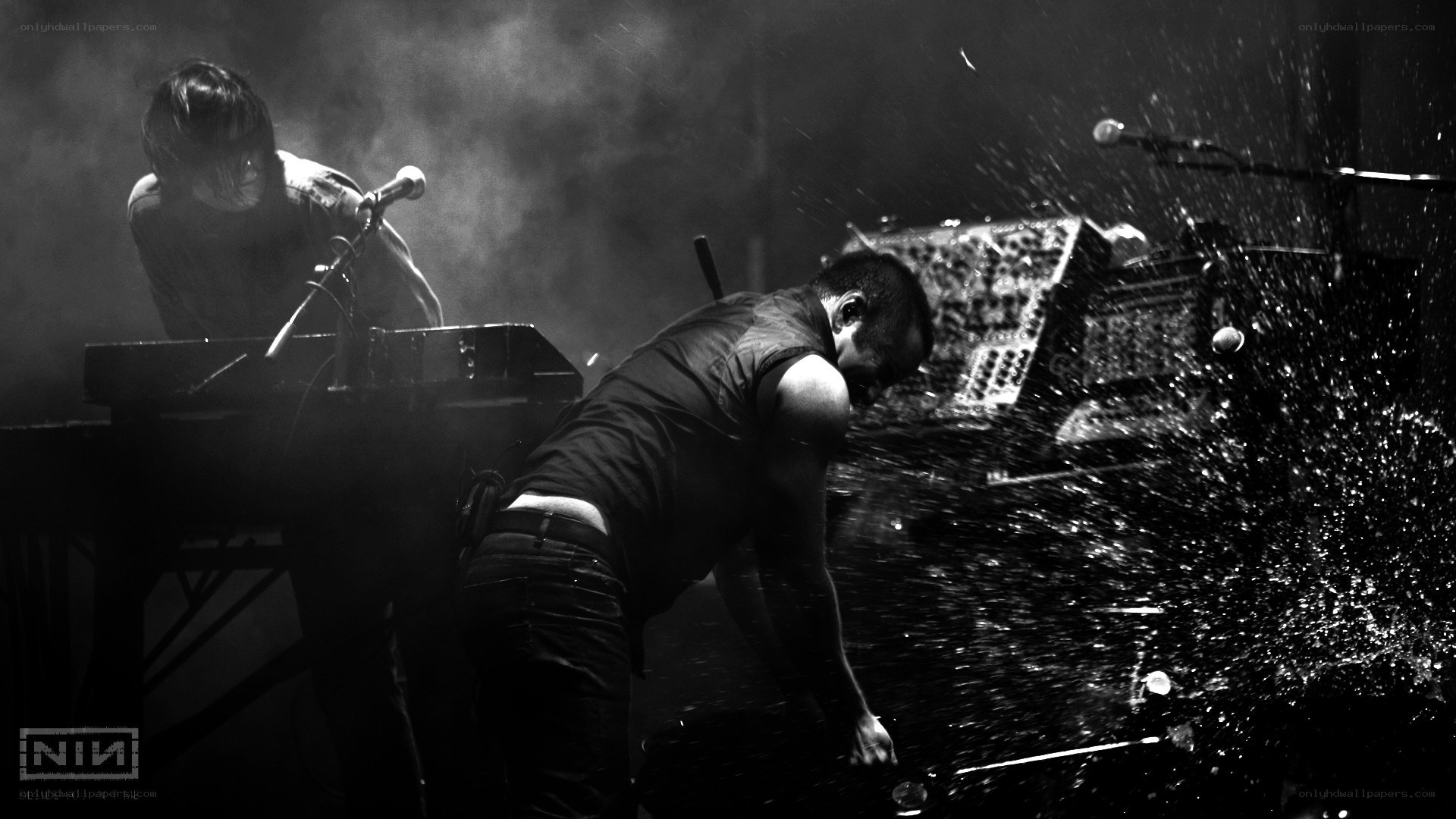 NIN performance with water spray