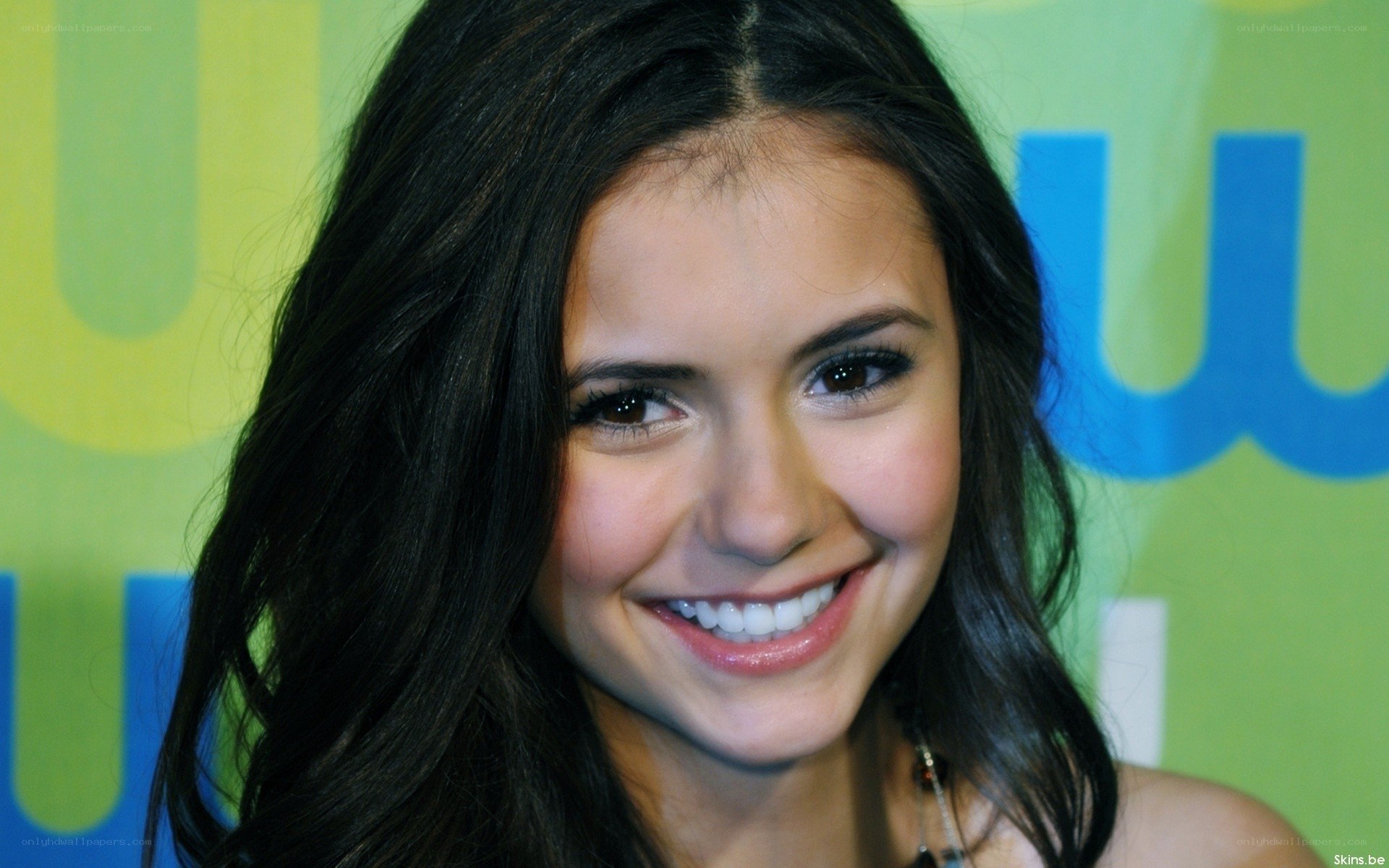 Nina Dobrev smiling at event