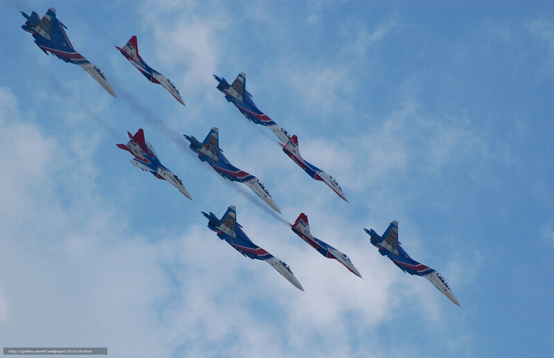 Nine Fighter Jets in Formation