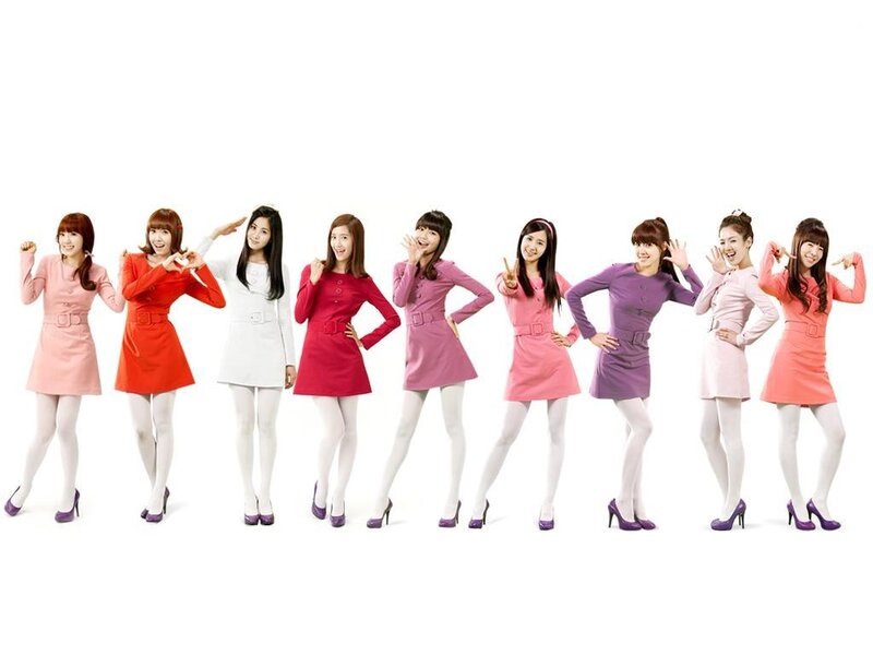 Nine Women in Colorful Dresses