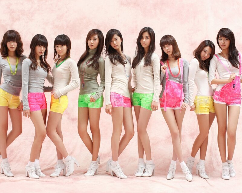 Nine Women in Colorful Outfits