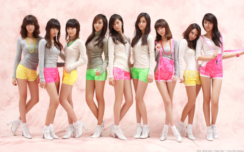 Nine Women in Colorful Shorts — Pink