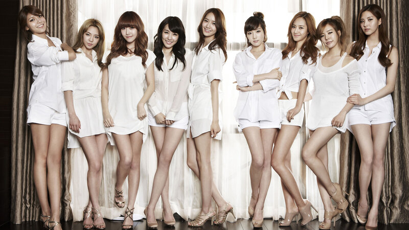 Nine Women in White Outfits — Confident