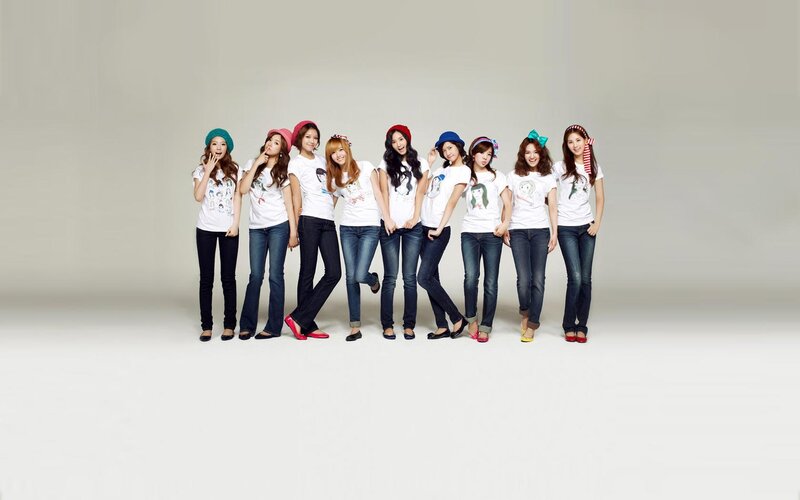 nine women in white t-shirts