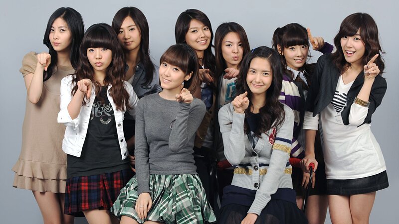 Nine Young Women Posing — Gray, Playful
