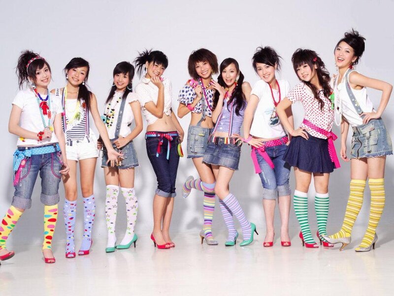 Nine Young Women Posing — White, Playful