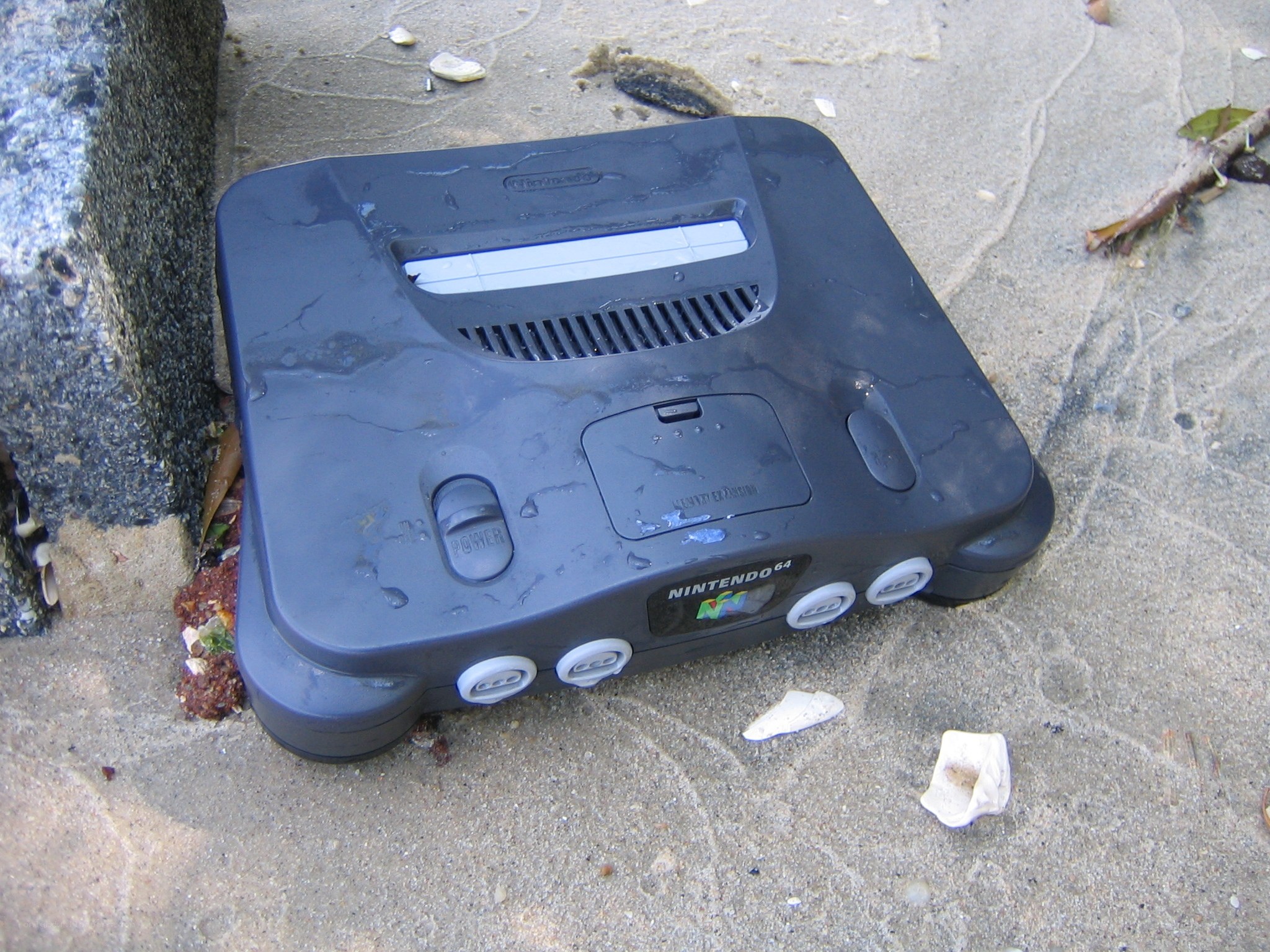 Nintendo 64 console on beach