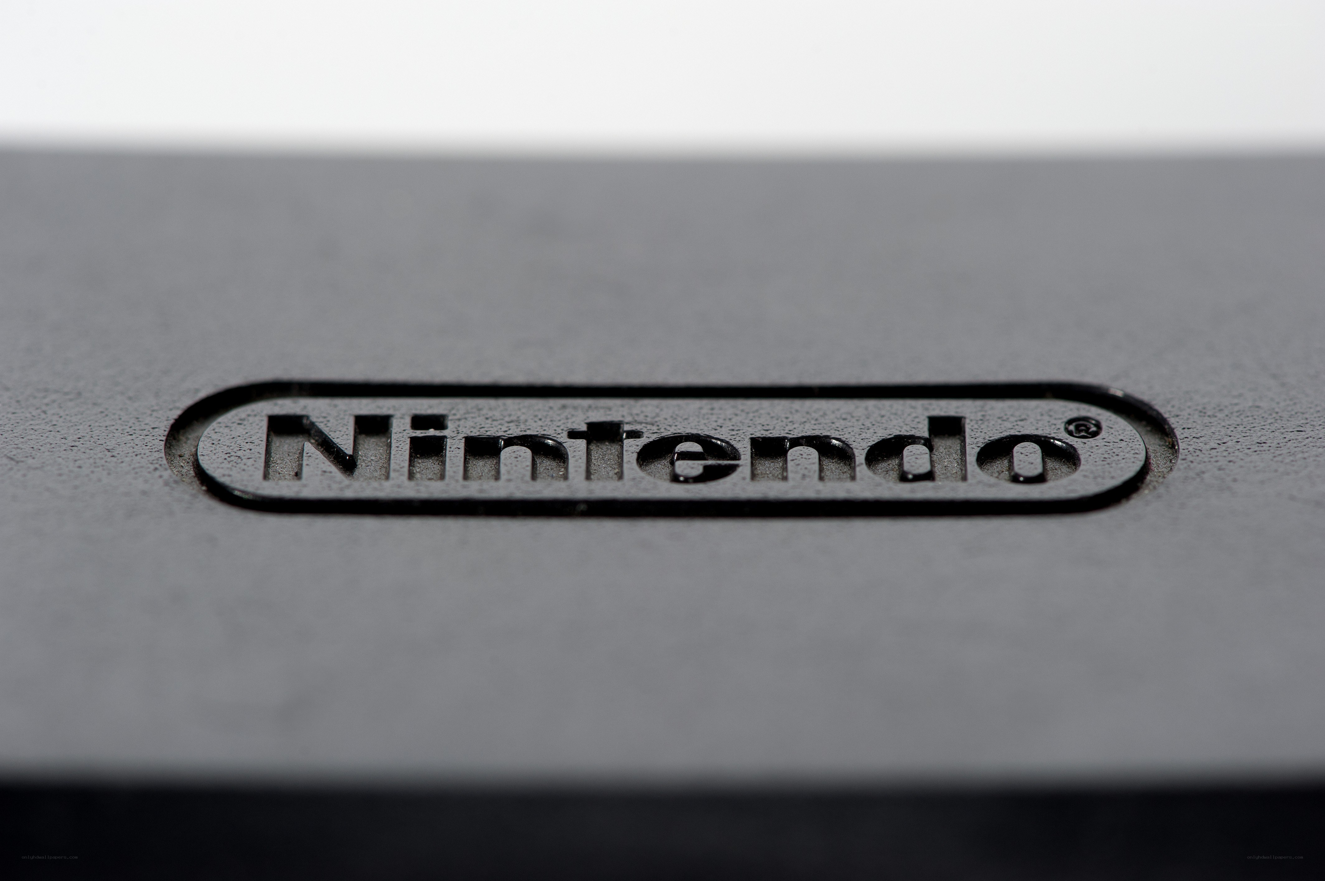 Nintendo logo on gray surface
