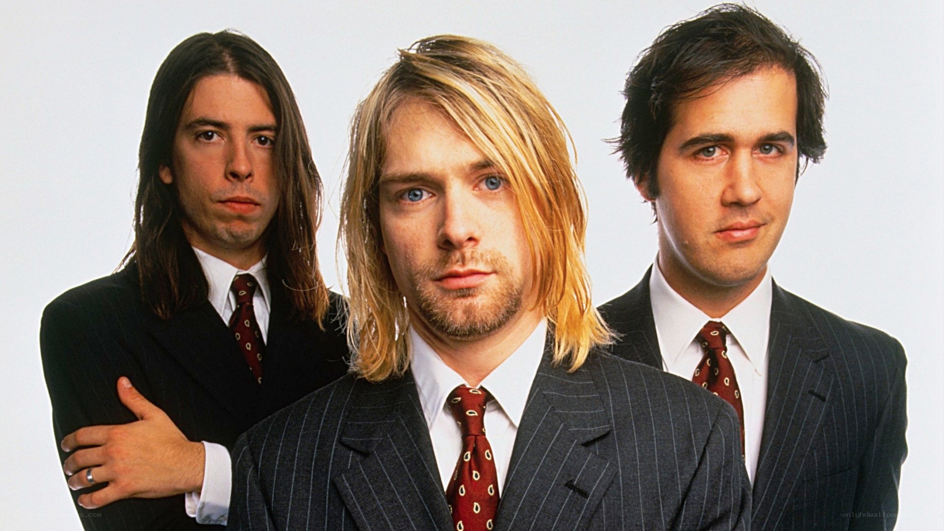 Nirvana band members in suits