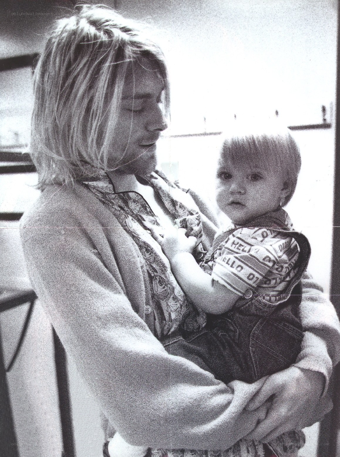 Nirvana frontman holding child