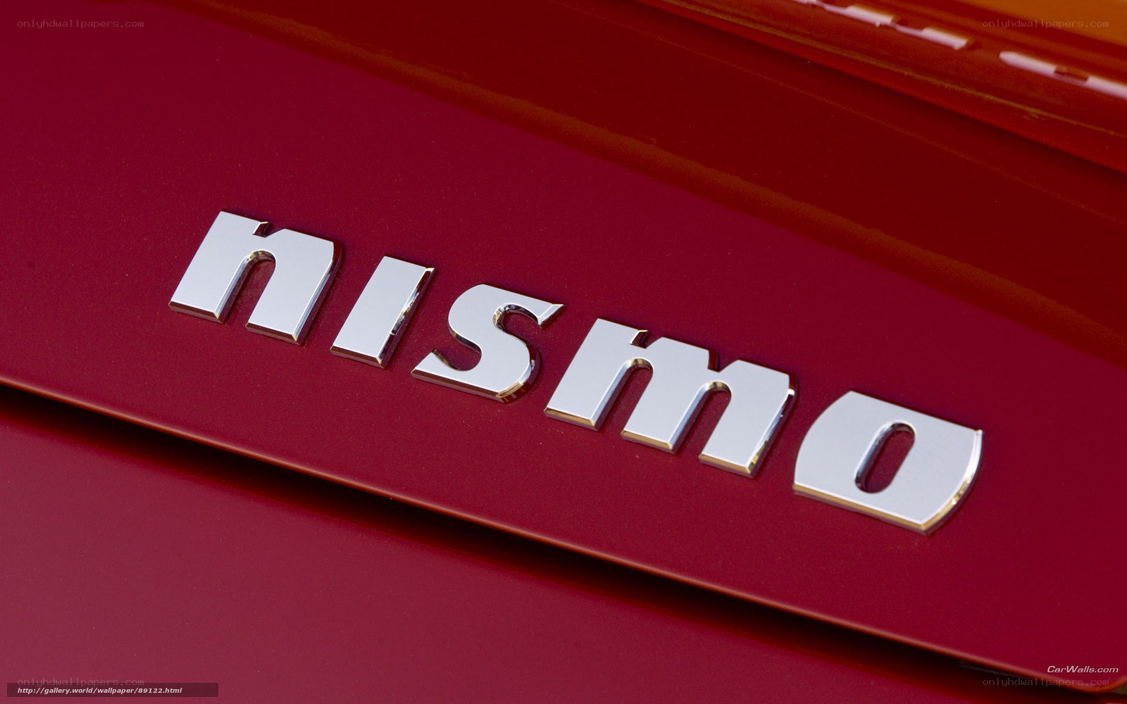 Nismo badge on red car