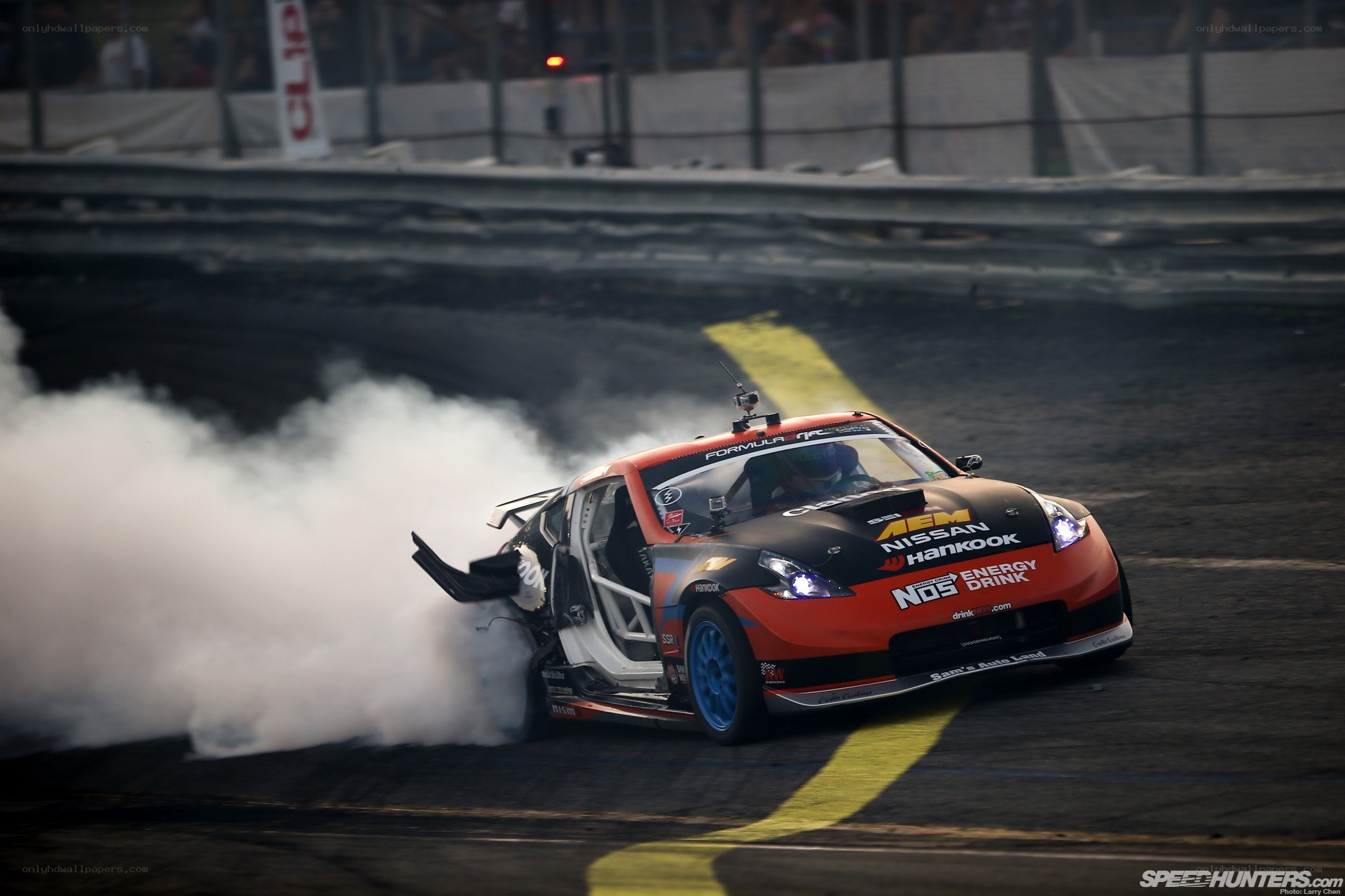 Nissan drifting on track