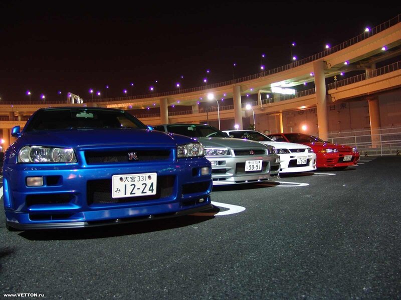 Nissan GT-R lineup at night