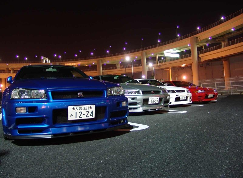Nissan GT-R lineup at night