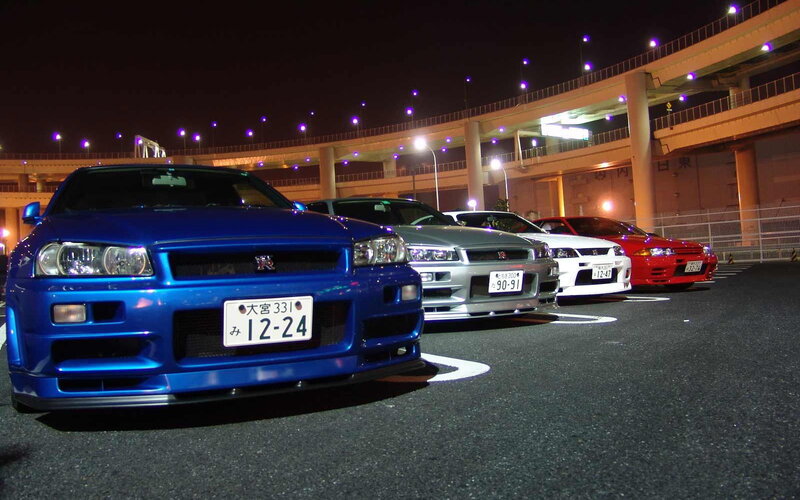 Nissan GT-R lineup at night