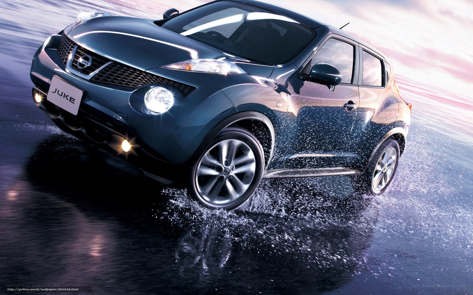 Nissan Juke driving on wet road