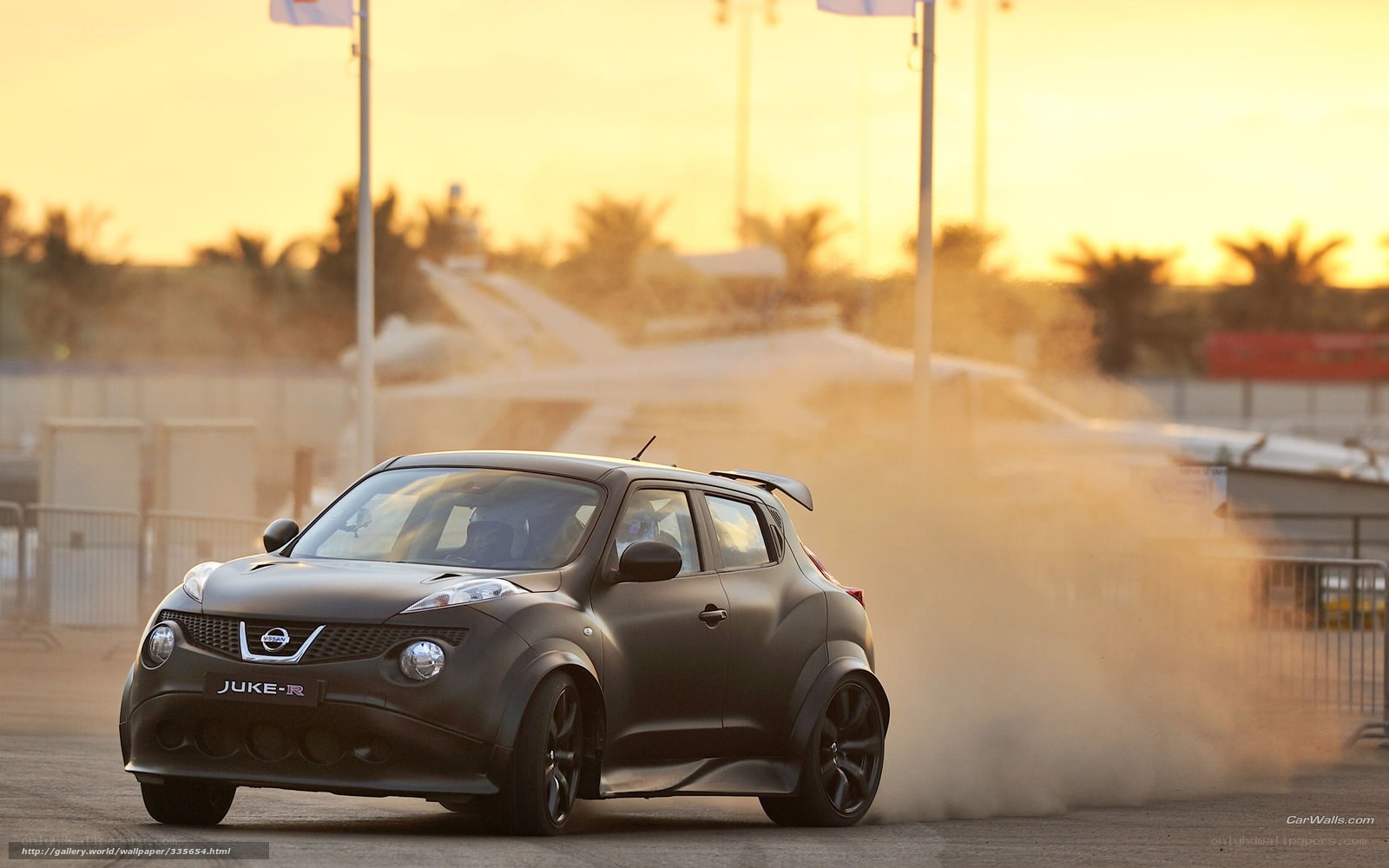 Nissan Juke-R drifting at sunset