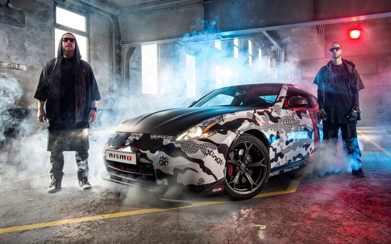Nissan Nismo car with two men