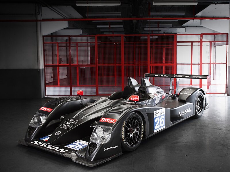Nissan race car in garage