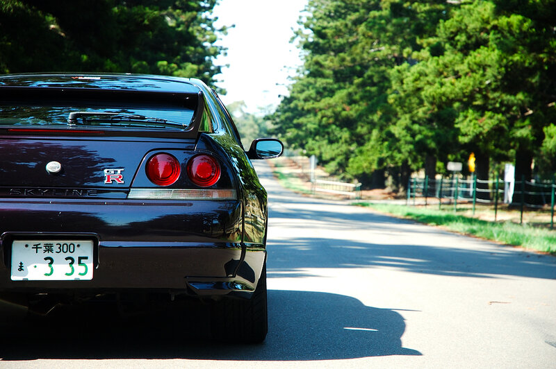 Nissan Skyline GT-R on a tree-lined road