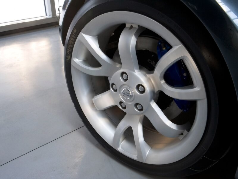 Nissan wheel with blue brake caliper