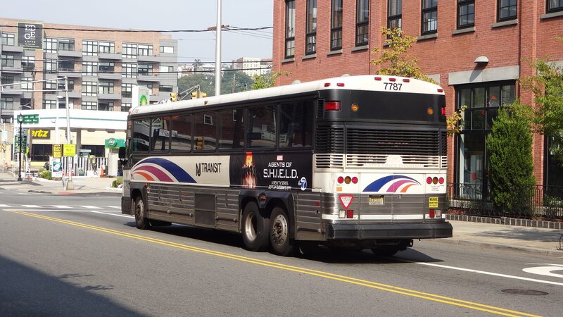 NJ Transit Bus on Street — Gray