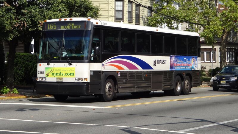 NJ Transit Bus on Street — White