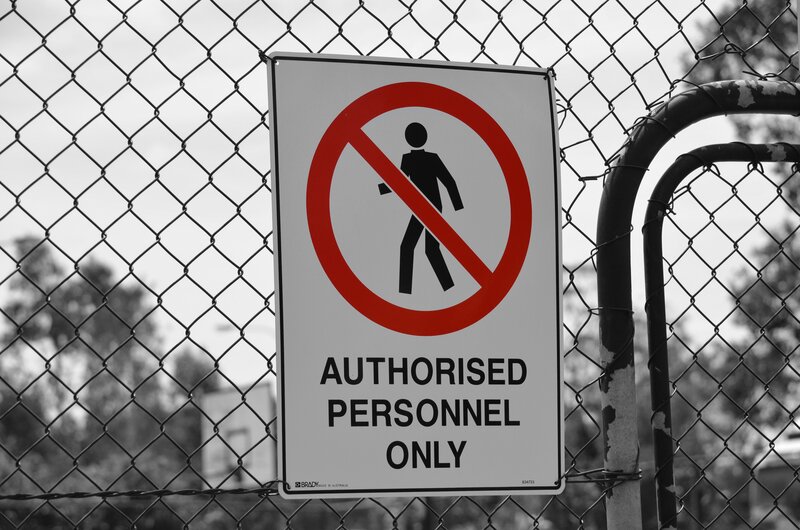 No entry sign on fence