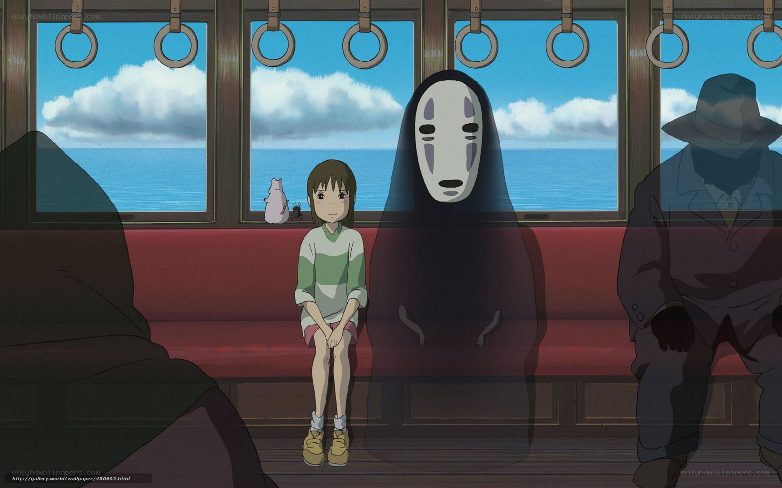 No-Face and Chihiro on a train