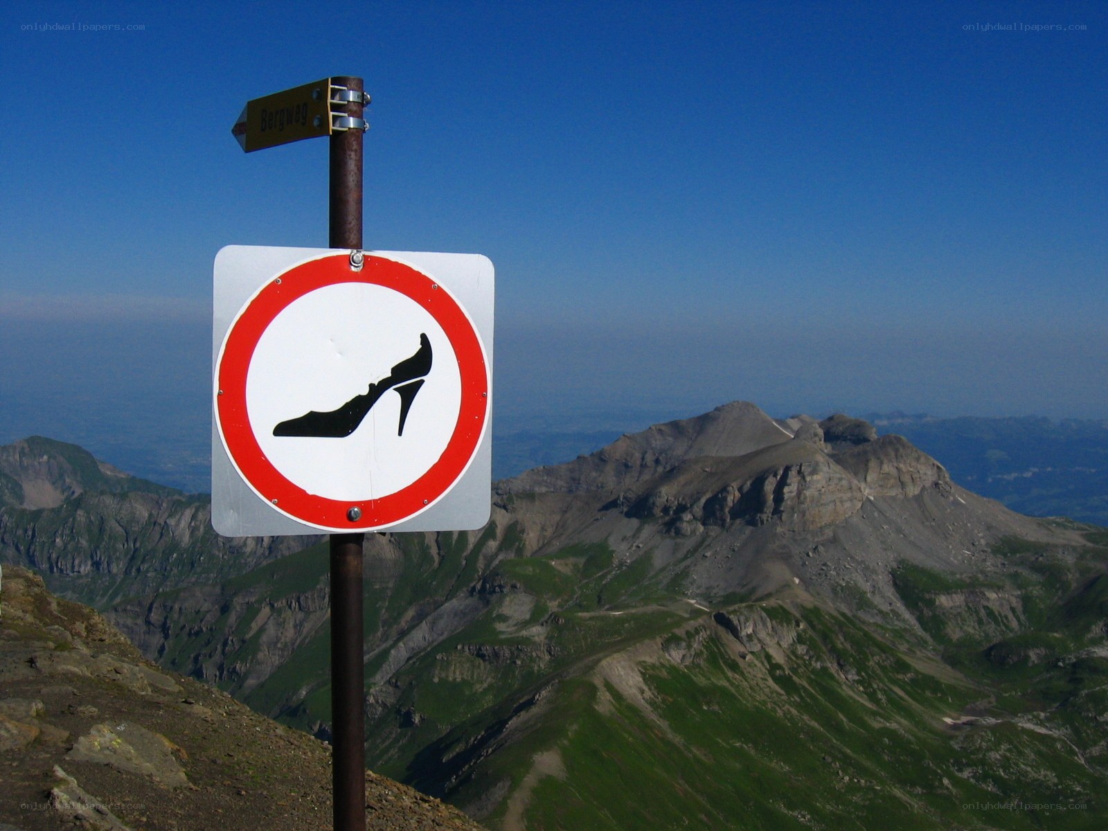 No high heels sign on mountain