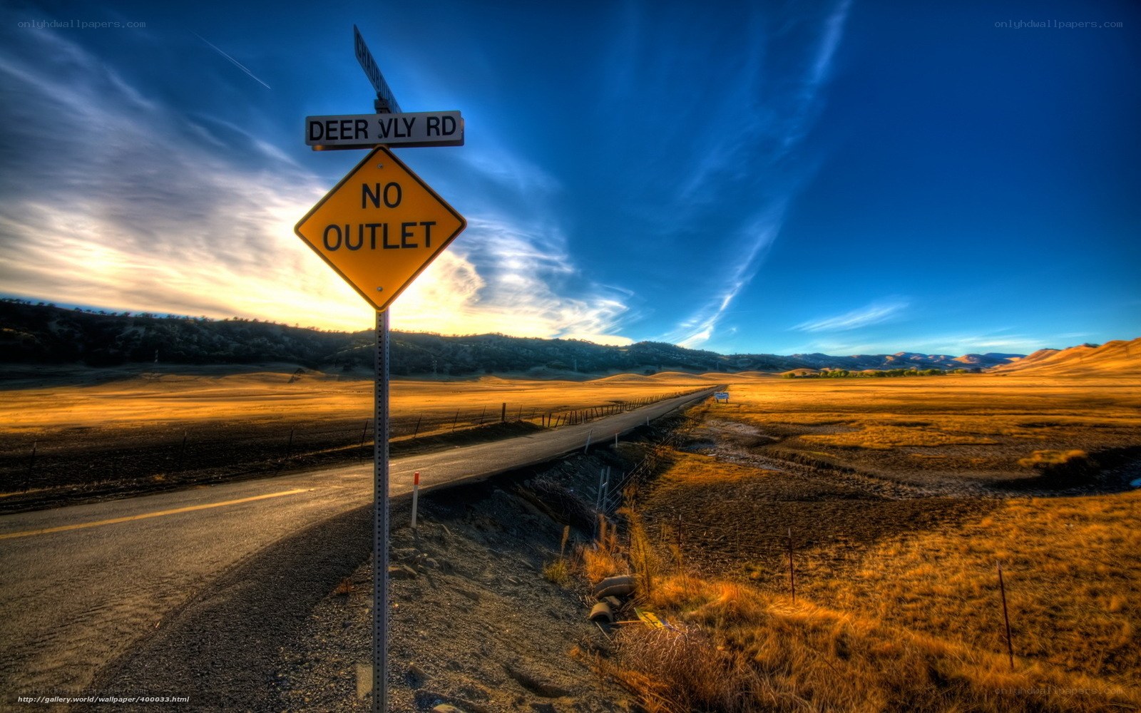 No Outlet Road Sign at Sunset