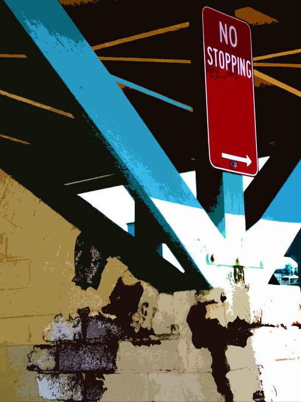 No Stopping sign under bridge