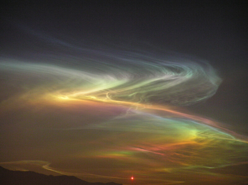 Noctilucent clouds at sunset