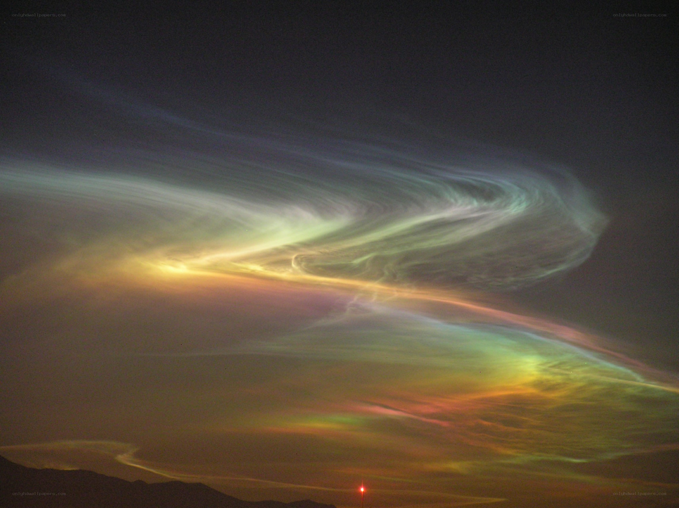 Noctilucent clouds at sunset