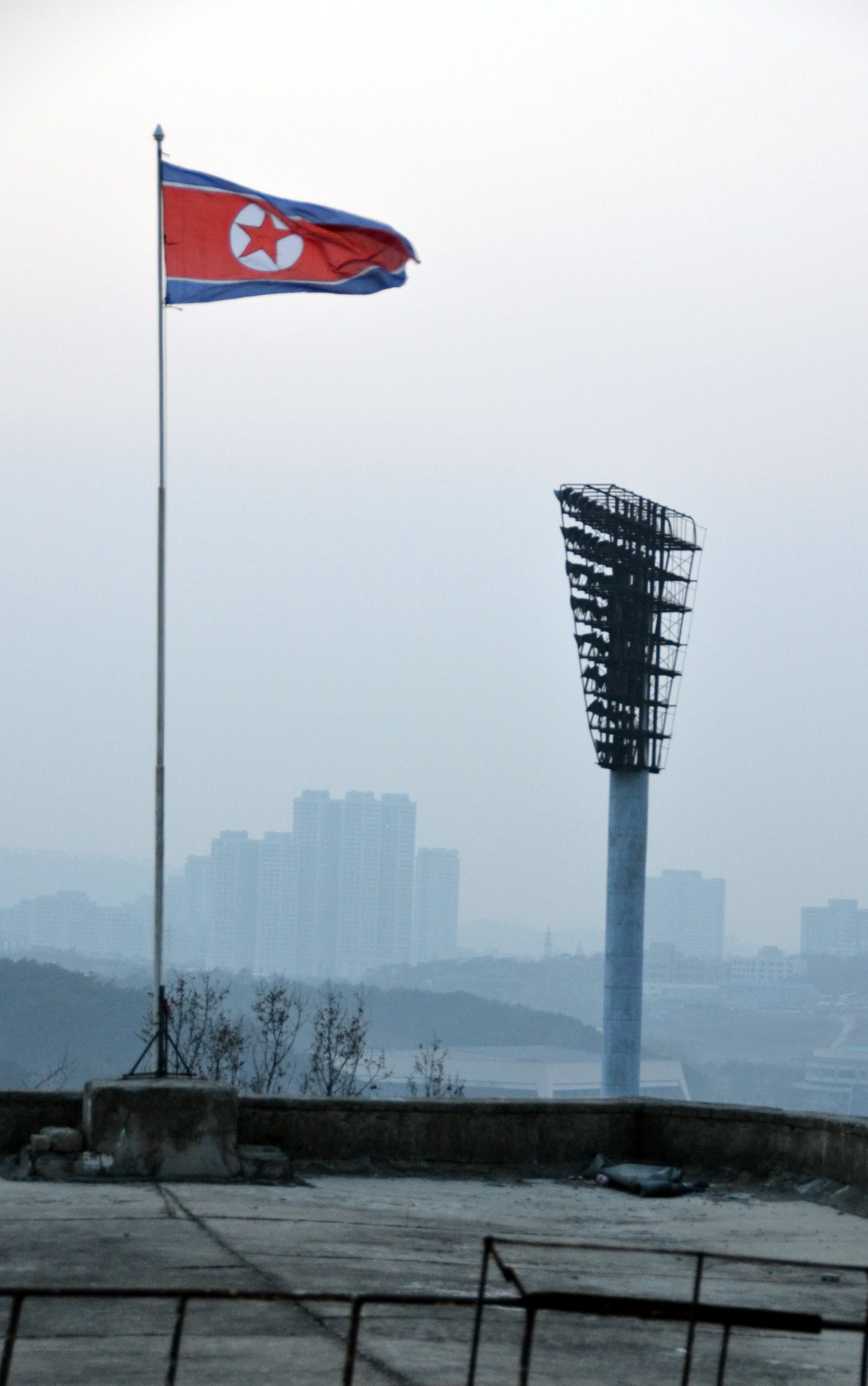 North Korean flag and stadium light