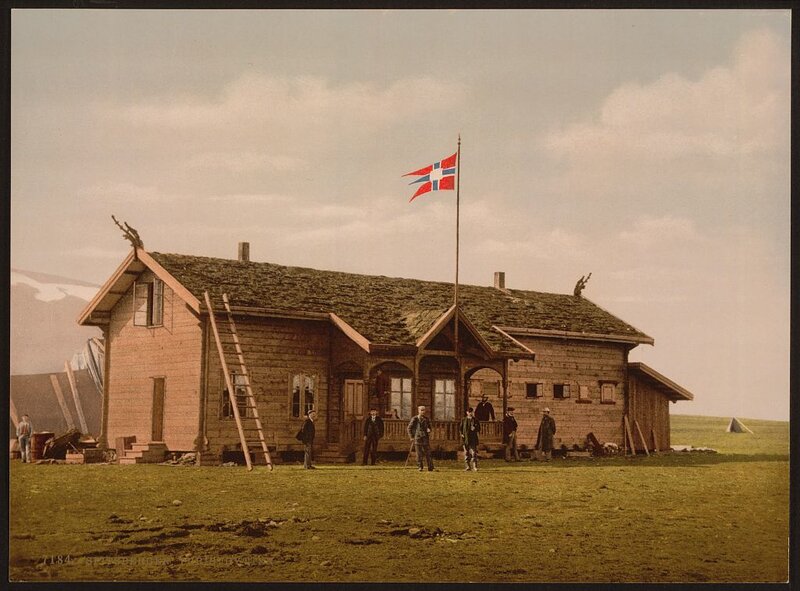 Norwegian flag at wooden building