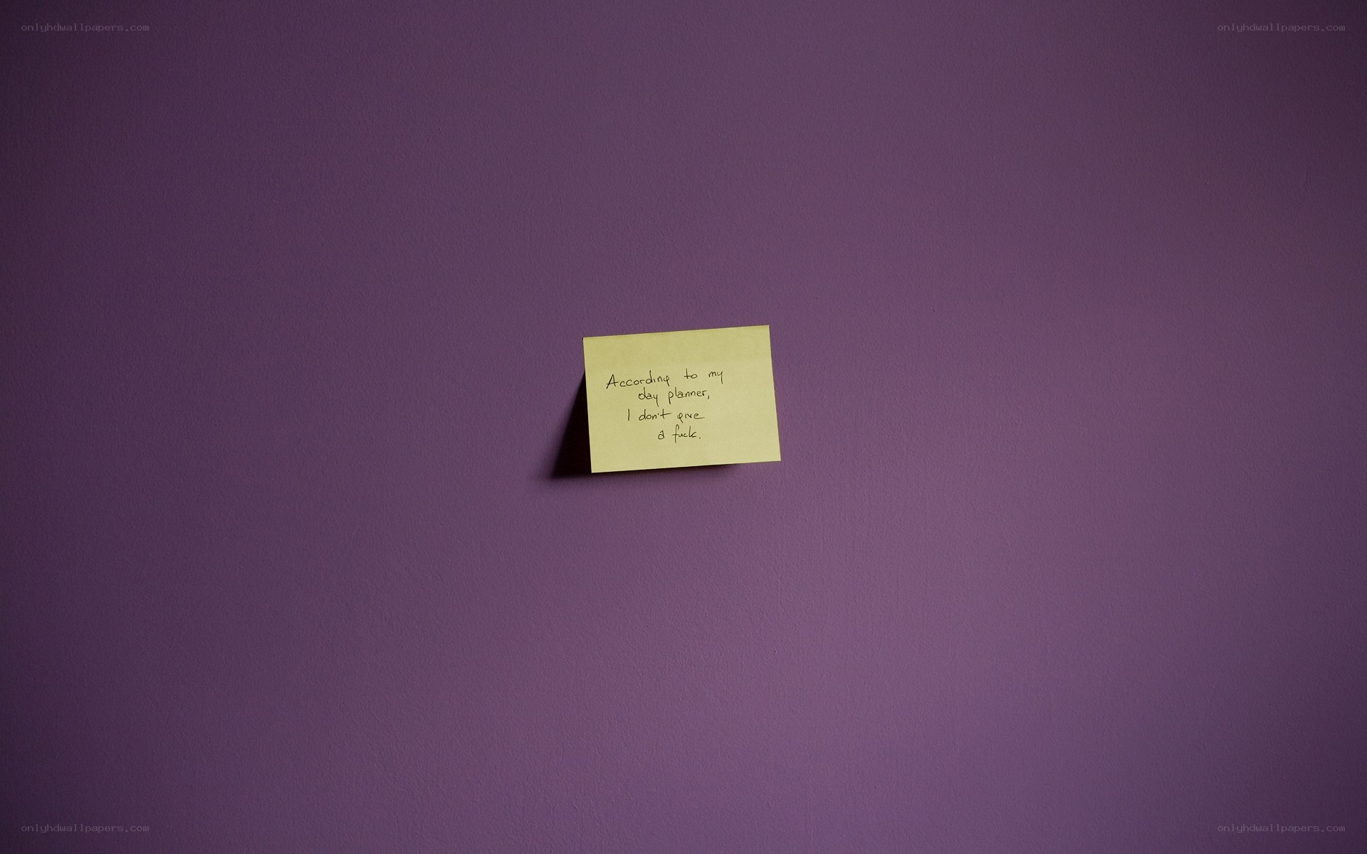 note on purple wall