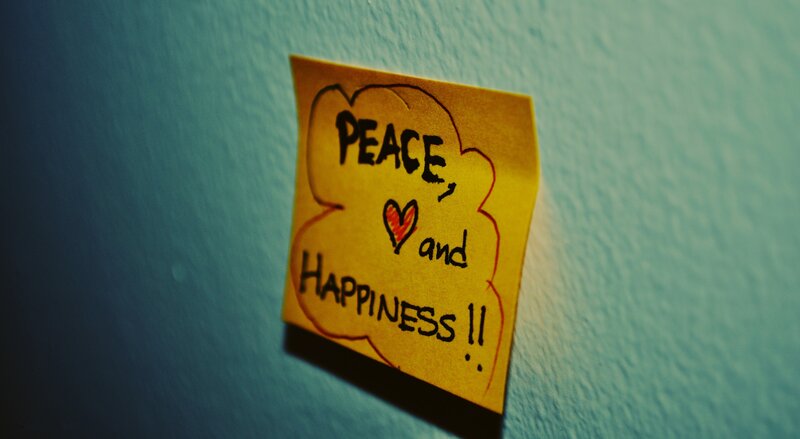 note with peace and happiness message